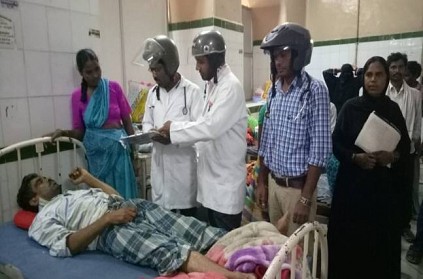 Doctors wear helmets at this popular government hospital
