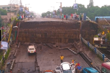 portion of a prominent bridge collapses in Kolkata