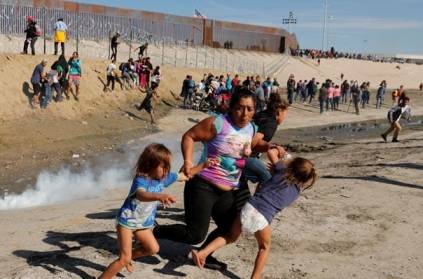 Mother and her children fleeing tear gas in US Border photo goes viral