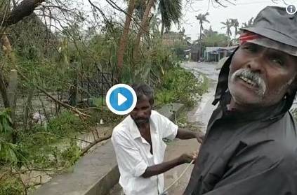 Retired EB men clearing electric poles & wires in Gaja Cyclone